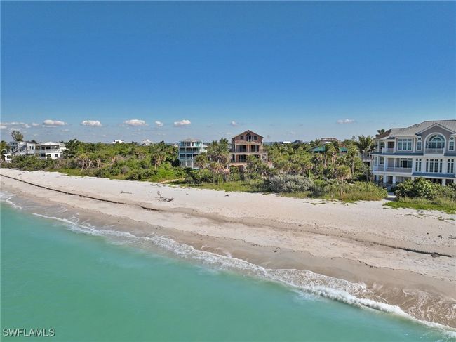 Aerial view featuring a view of the beach and a water view | Image 15