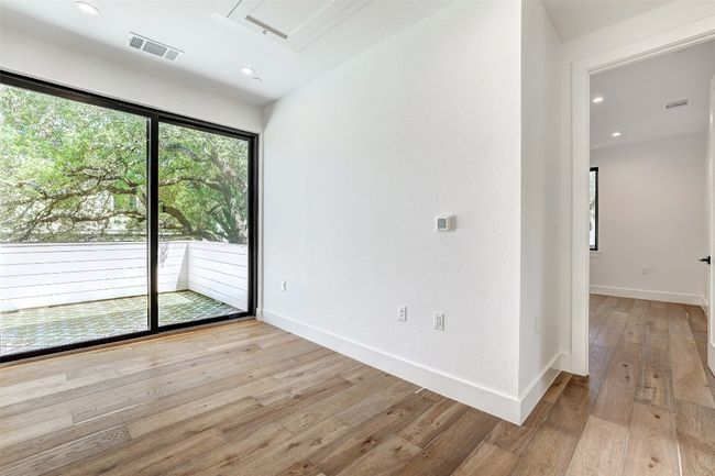 Unfurnished room with light wood-style floors, baseboards, and recessed lighting | Image 20