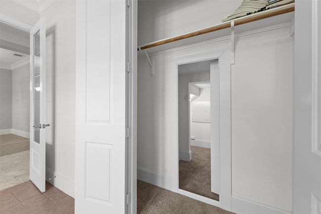 Did you spot the hidden walk-in closet? It tucks away behind the office door—great for stashing files, office gear, or extra storage without cluttering your workspace. | Image 11