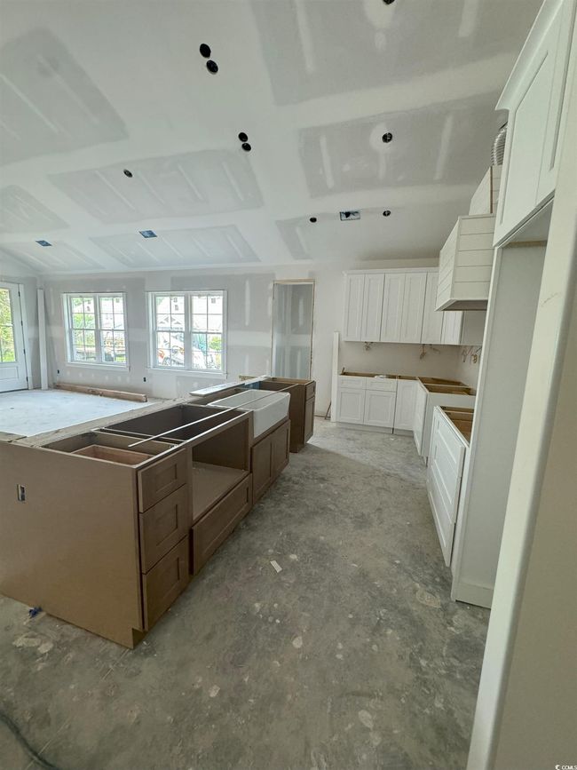 Kitchen featuring white cabinetry | Image 20
