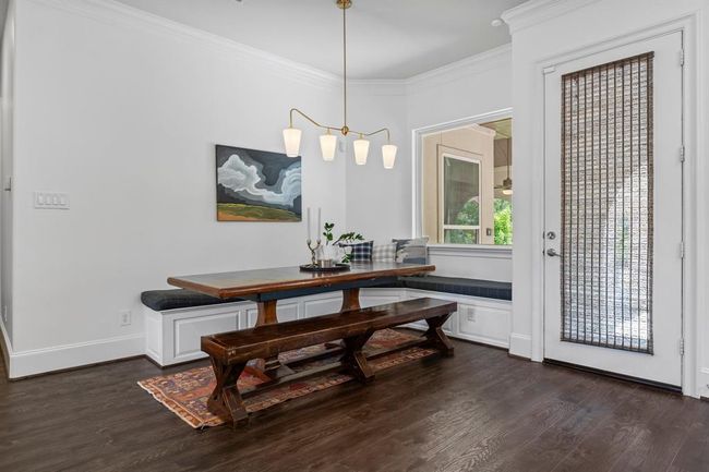 Breakfast area off the kitchen, modern lighting and fresh paint! | Image 15