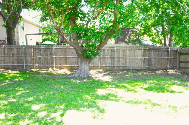View of yard featuring a fenced backyard | Image 29