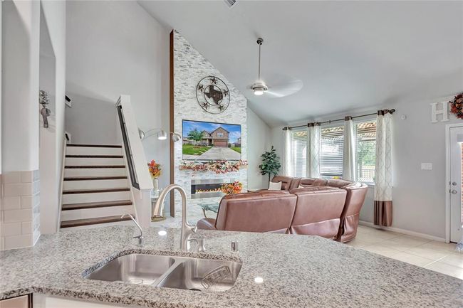 another view from kitchen to living room | Image 17