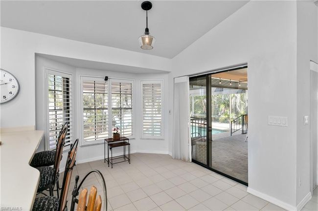 12321 Moon Shell Dr, House other with 3 bedrooms, 3 bathrooms and 2 parking in MATLACHA ISLES FL | Image 12