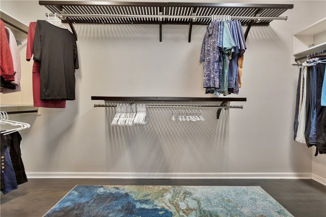 Primary bedroom walk-in closet. | Image 28