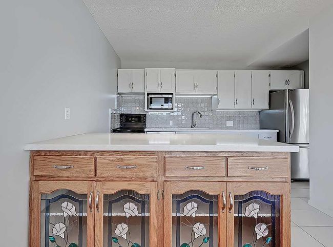 100 - 524 Cedar Crescent Sw, Condo with 2 bedrooms, 1 bathrooms and 1 parking in Calgary AB | Image 20