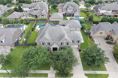 Fabulous 2-story Trendmaker home with a 3-car oversized, detached with porte-cochere is awaiting your arrival in Sterling Lake Estates, a section known for 100-foot wide lots, in the master planned community of Fairfield! | Image 1