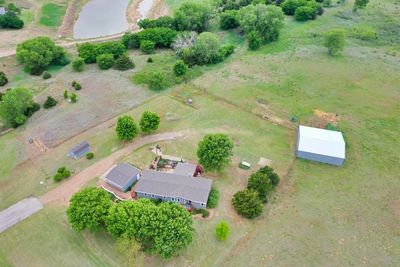 Beautiful 5 bedroom, 3 bathroom home on 29.73 acres with huge barn, workshop, new roof and HVAC with incredible theater room and 2 huge downstairs bedrooms with kitchenette and full bathroom. | Image 1