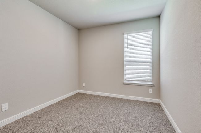 View of carpeted spare room | Image 17