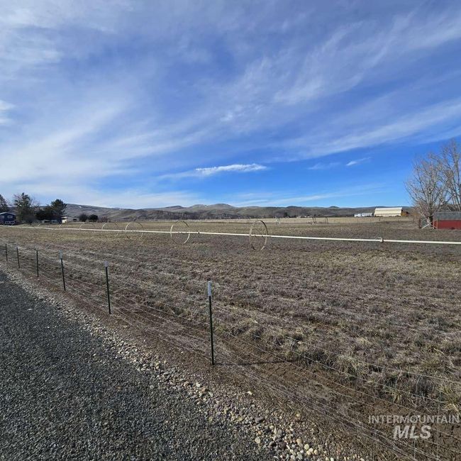 View of yard featuring a mountain view and a rural view | Image 33