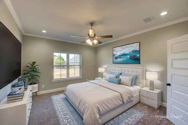 Bedroom with ornamental molding and ceiling fan | Image 11