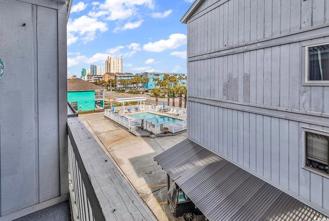 Balcony featuring a city view | Image 31