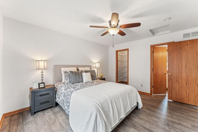 Main level primary bedroom with attached bathroom | Image 8