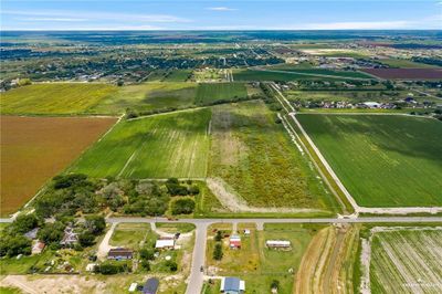 Bird's eye view featuring frontage with Mile 4 and residential subdivision in front | Image 2