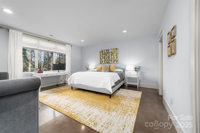 Over-sized guest suite on lower level. | Image 21