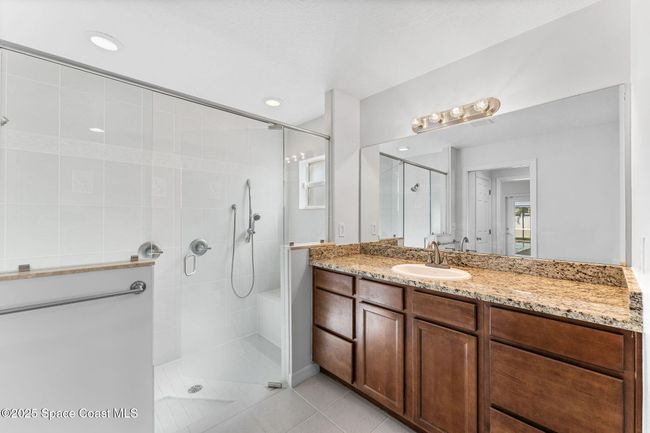 Suite #1 walk in shower w/pull down sprayer and built in seat | Image 72