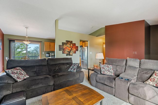 908 24th Ave NW - view from living room to dining area and kitchen | Image 5