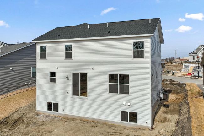 Rear exterior. Sod, landscaping and irrigation are included! | Image 26