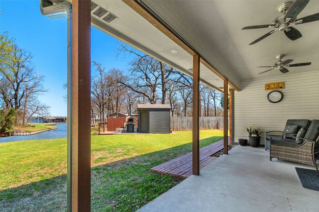 Beautiful covered porch with waterfront view | Image 4