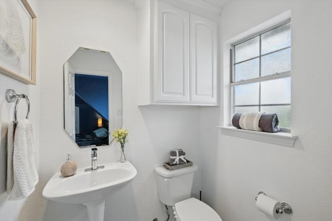Upstairs 1/2 bath in bonus room space. | Image 31