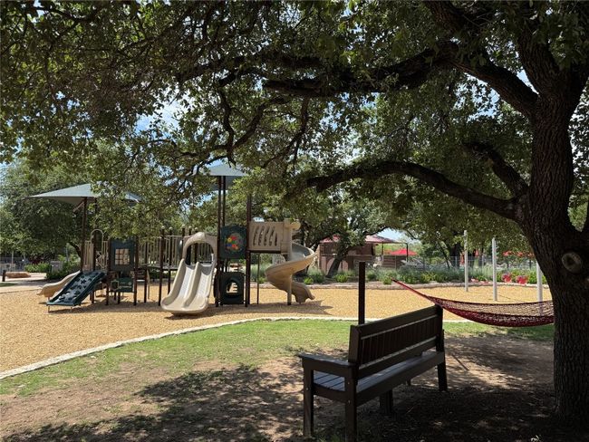 Shade covered playground at the amenity center. Great place to make friends. | Image 36