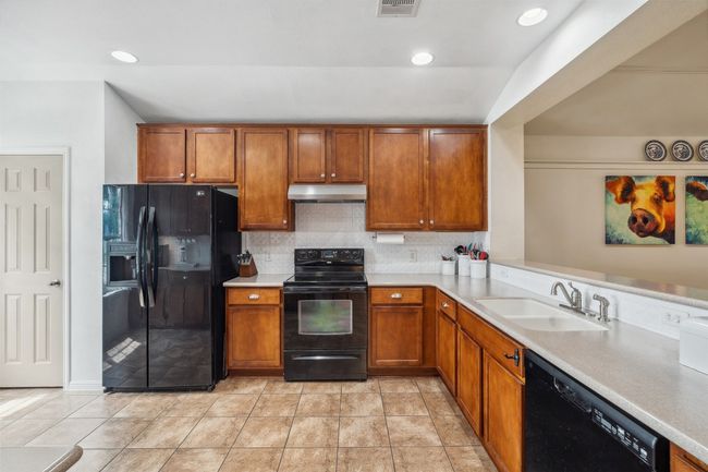 Large kitchen open to the dining room. | Image 13