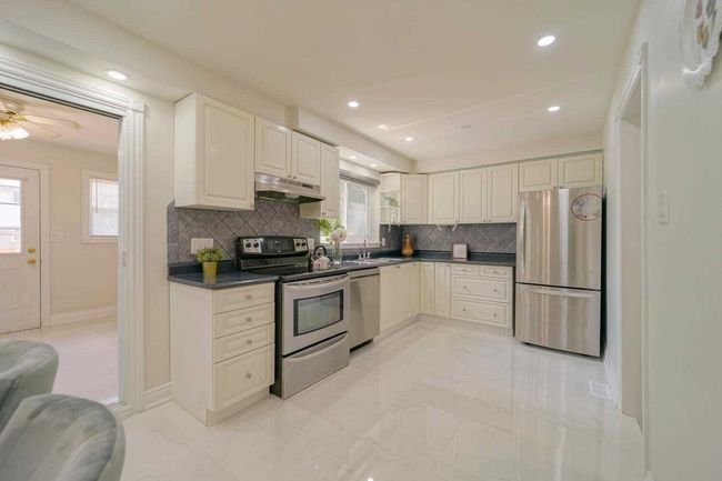 MAIN - 20 Ardglen Dr, House attached with 4 bedrooms, 2 bathrooms and 2 parking in Brampton ON | Image 4