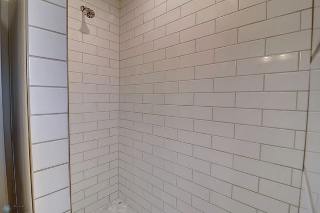 Custom Tiled Walk In Primary Shower | Image 33