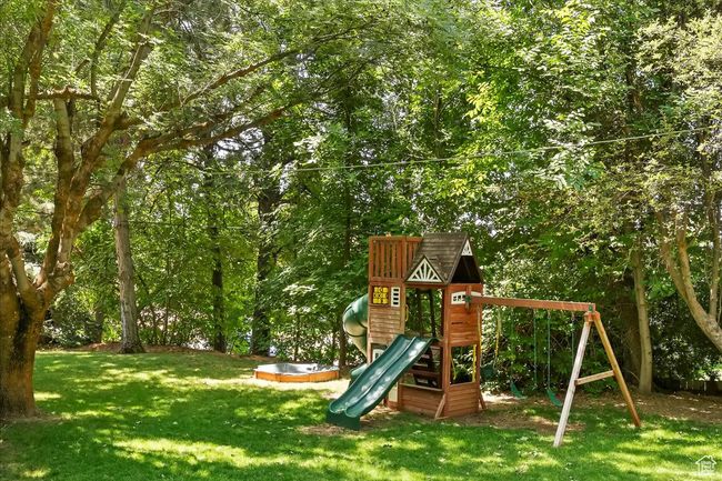 View of play area featuring a yard | Image 66