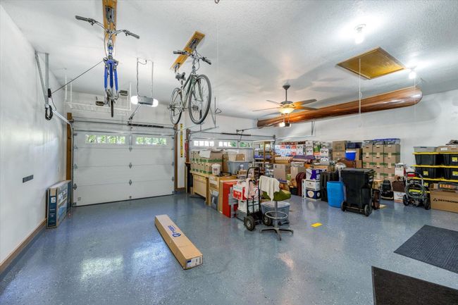 900+ sq ft 3 car heated garage! Epoxy floors, drain, and central vacuum! | Image 46