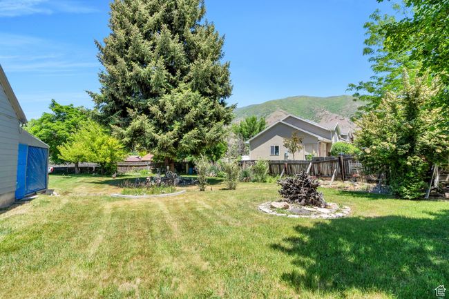 View of yard with a mountain view | Image 13