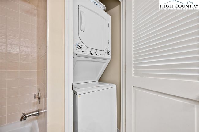Stacked washer and dryer in 2nd bath | Image 21