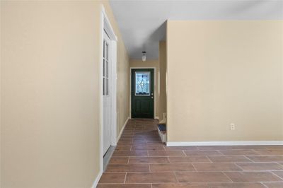 Easy to care for tile floors with a wood look. | Image 2