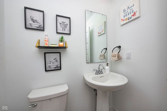 bathroom featuring toilet | Image 16