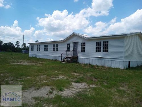 604 Tower Rd Ne, Ludowici, GA, 31316-7083 | Card Image