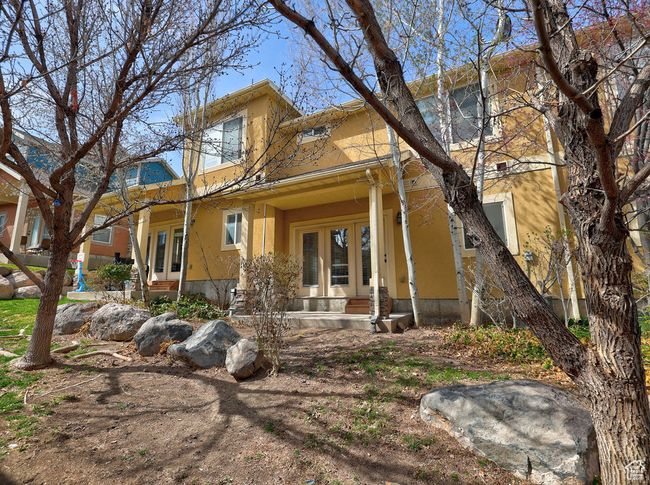 View of front of house with french doors and stucco siding | Image 33