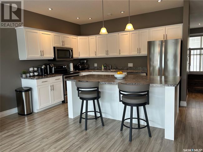 6 - 697 Sun Valley Dr, Townhouse with 4 bedrooms, 4 bathrooms and null parking in Estevan SK | Image 7