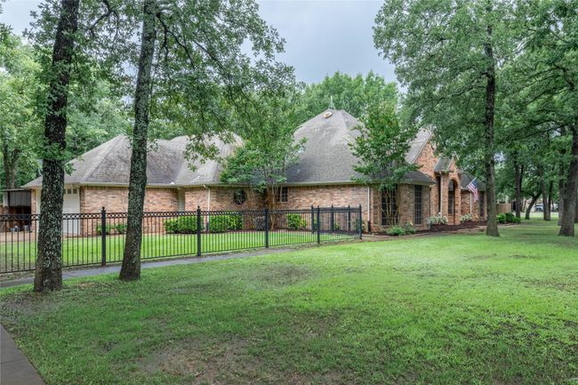 View of yard featuring a garage | Image 5