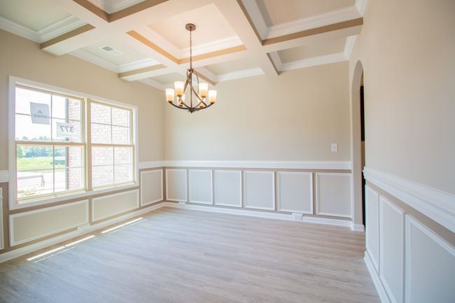 Large Formal Dining Room with Chair Railing, Wainscoting and a Coffered Ceiling! | Image 4