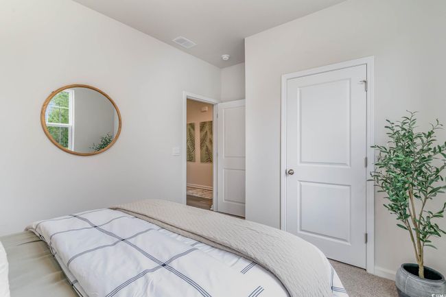 Bedroom featuring baseboards and light carpet | Image 17