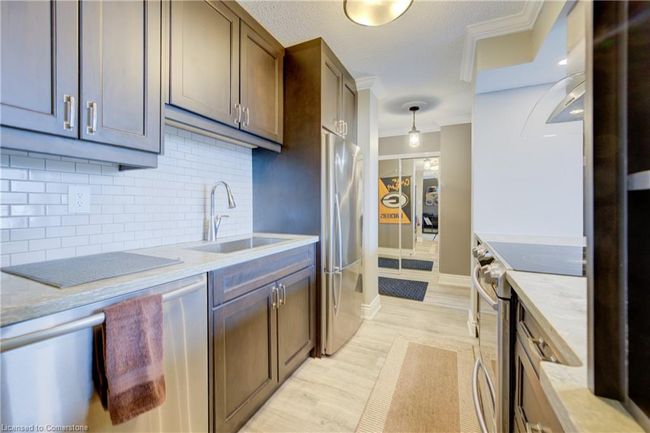 702 - 222 Jackson St W, House attached with 1 bedrooms, 2 bathrooms and 1 parking in Hamilton ON | Image 4