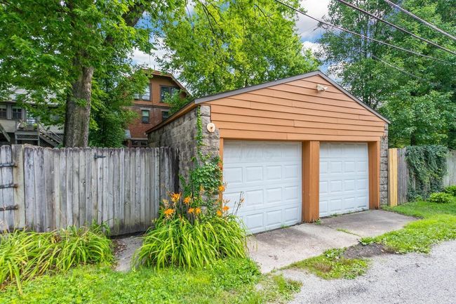 Enjoy garage parking with alley access | Image 56