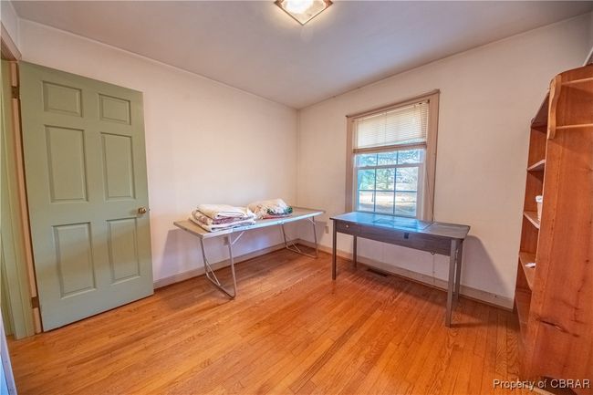 Home office with light hardwood / wood-style floors | Image 24