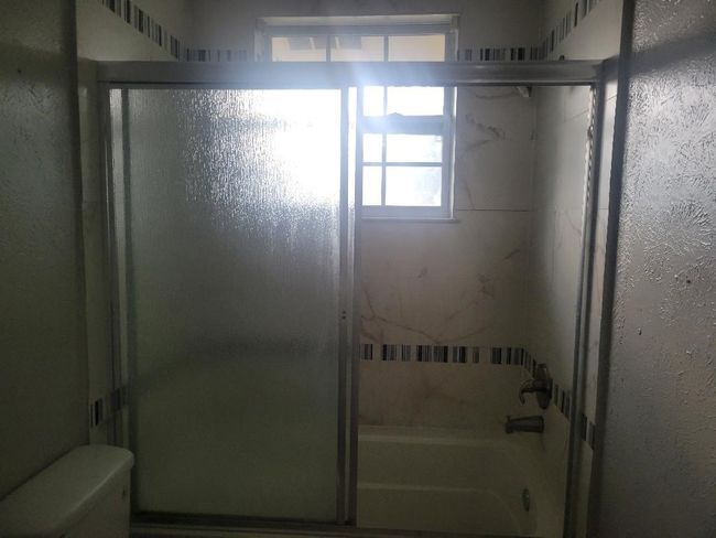 2nd full bath upstirs with tub | Image 11