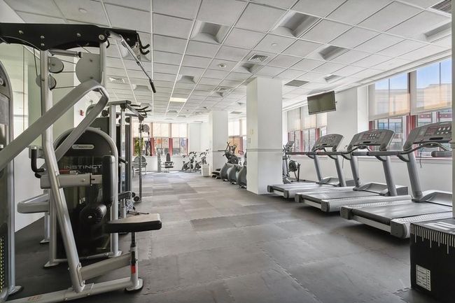 Exercise room featuring a drop ceiling | Image 19