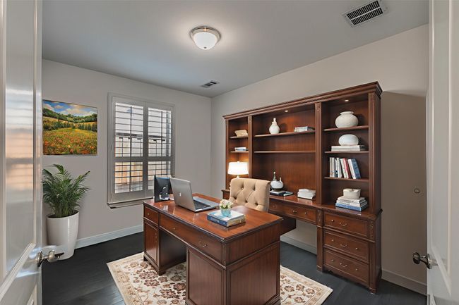 Office with dark wood-style flooring and baseboards | Image 15