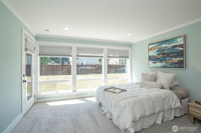 Sweet Dreams are what you will experience in this Spacious Primary Suite with extra large windows and a door which leads to a beautiful studio. | Image 12