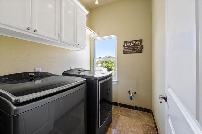Laundry room with connections ready for a sink | Image 43