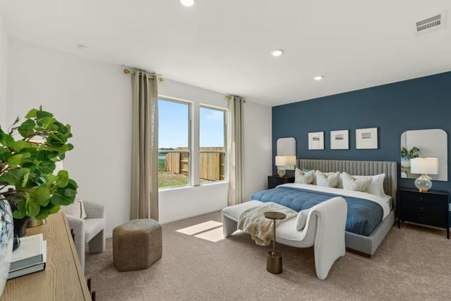Photo of Pulte model home with same floor plan, not of actual home listed. | Image 12