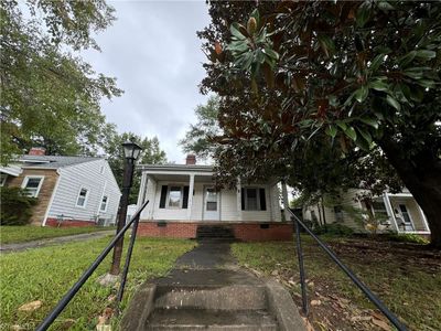 Beautiful magnolia and large covered porch | Image 2